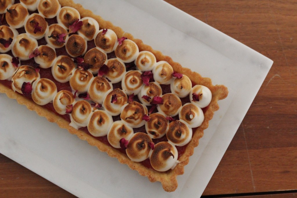 Pomelo rose tart with burnt honey meringue